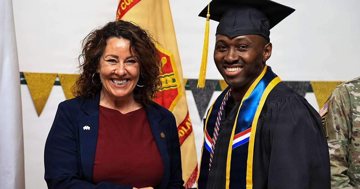 A recent graduate at a graduation ceremony